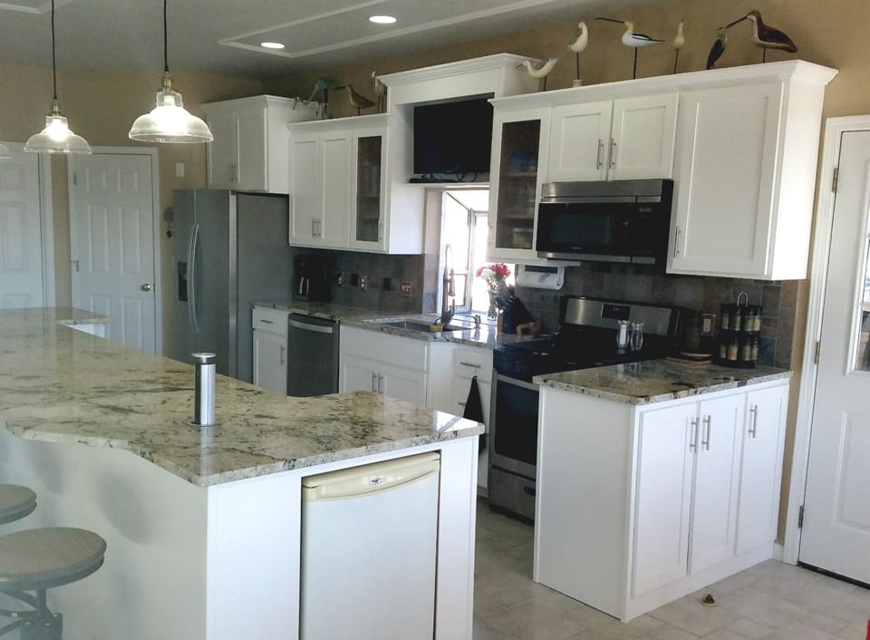 Beverage fridge in the kitchen island, plus USB & electrical outlets in island
