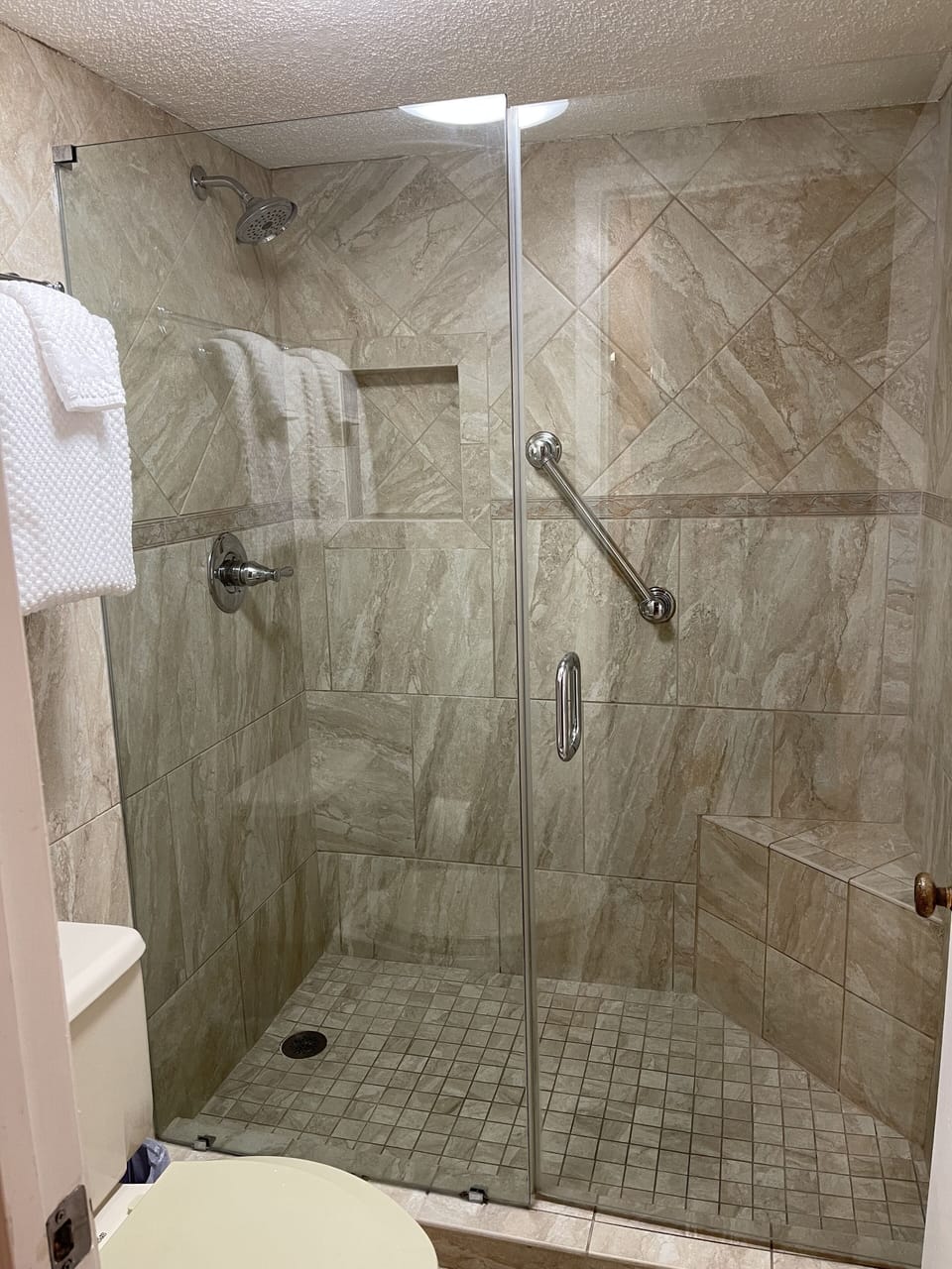 Master shower with awesome tile work.
