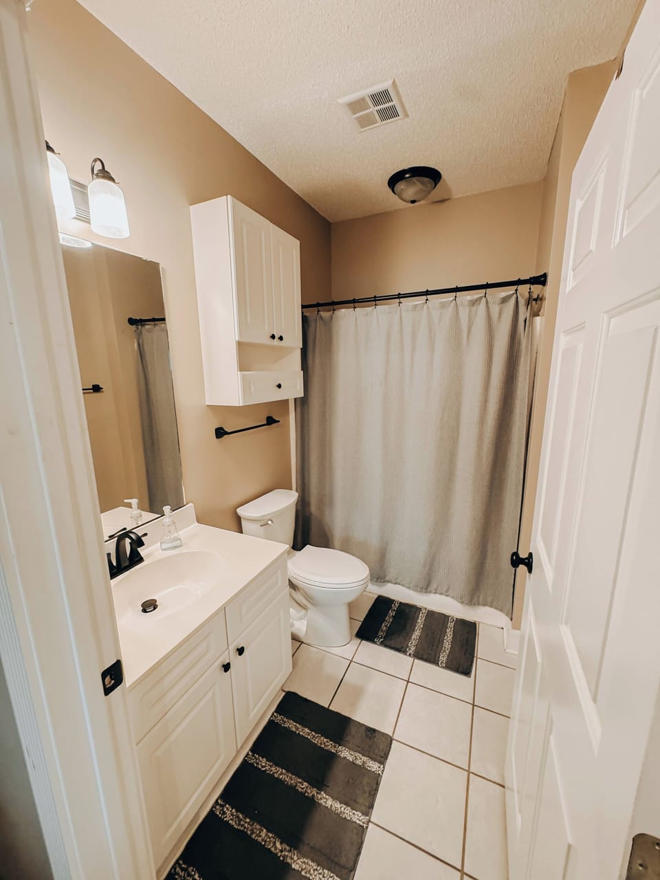 Primary bathroom with tub and shower