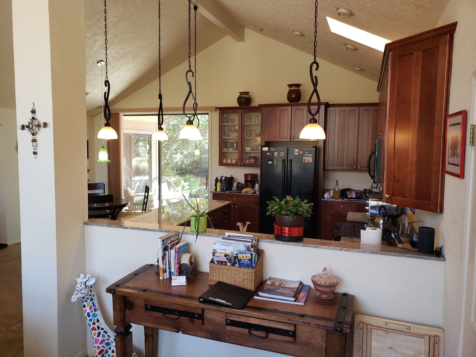 Open floor plan with a view of the kitchen.