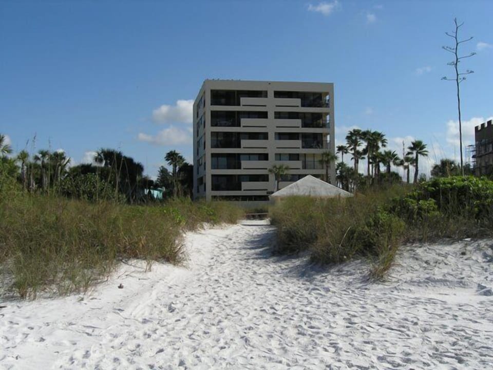 View of Siesta Sands Beach Resort tower from the beach