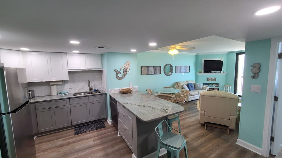 Open concept Kitchen / dining / living room makes more memories