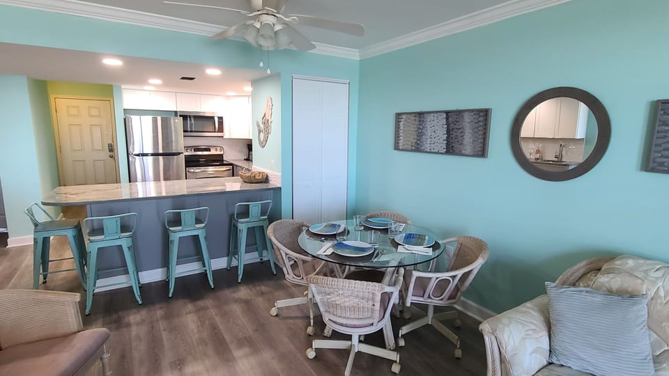 Well Equipped Kitchen with Counter and Dining Space