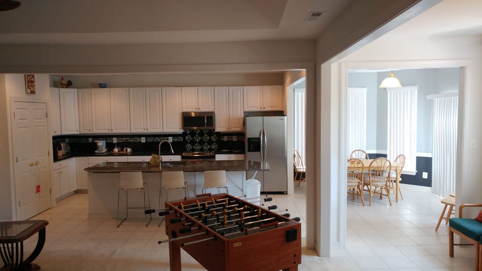 as you gather, you can watch the kids have fun playing foos ball