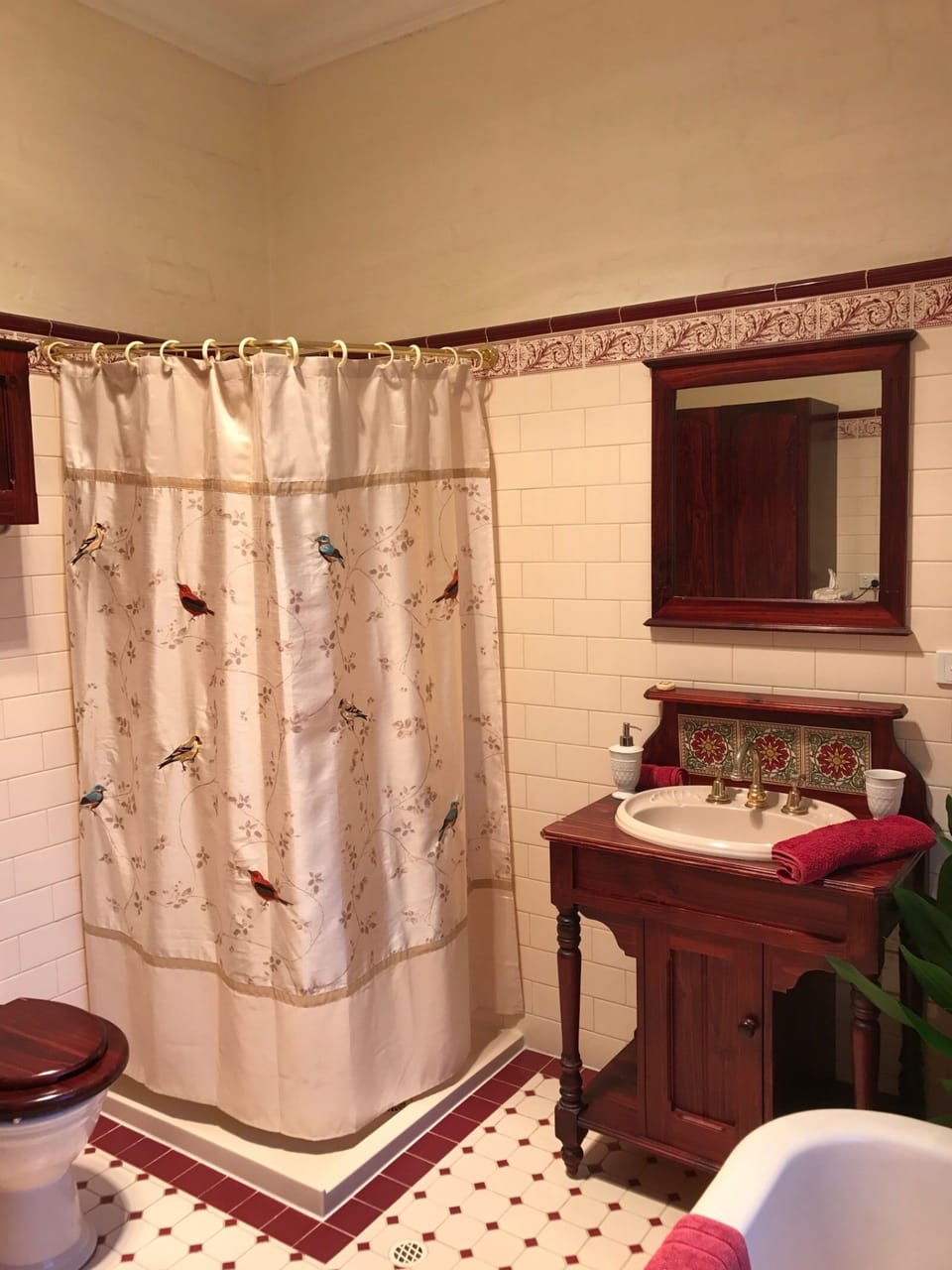 Separate shower and a claw footed bath