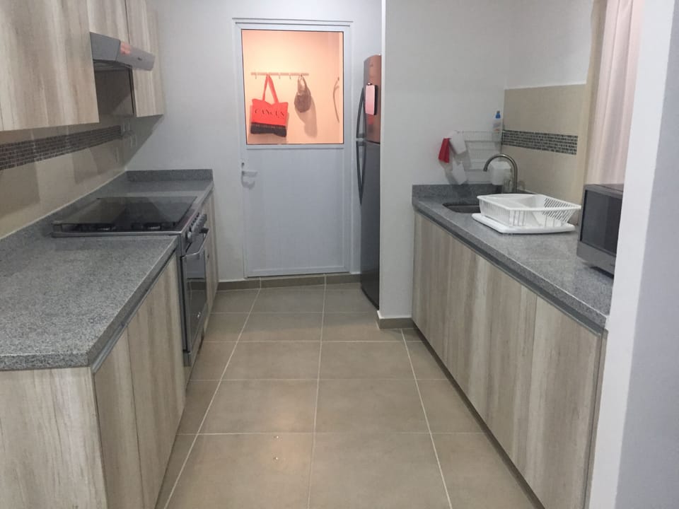 Kitchen with a laundry room