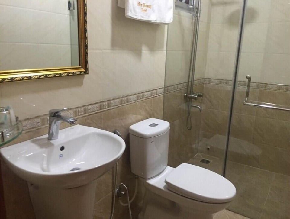 Shower, free toiletries, hair dryer, slippers