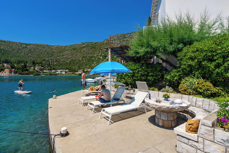 Waterfront with sunbeds