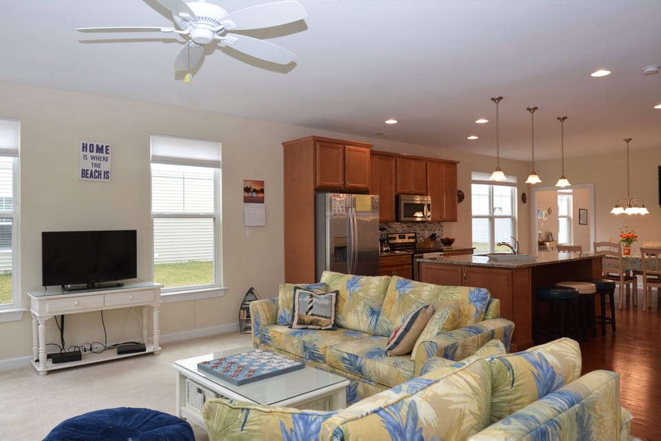 Welcome to Shoal Harbor!  Inviting Recently Built End Unit Sleeping 8 People
Living Room with French doors to the Patio.