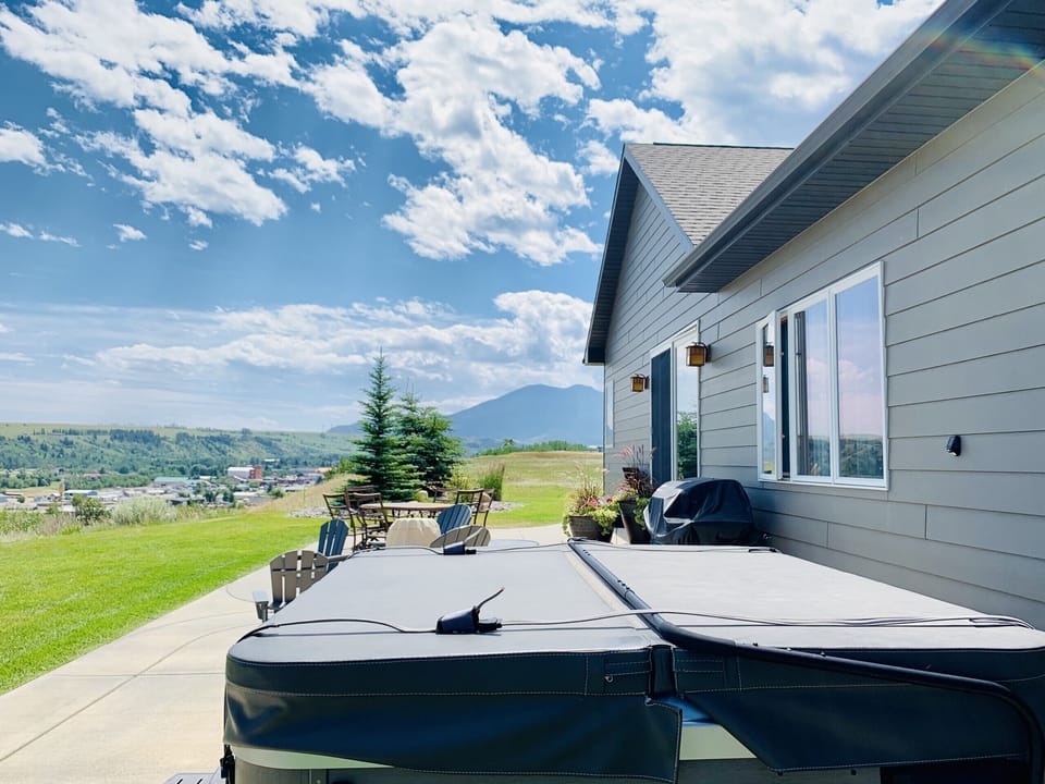Back Yard with Hot Tub and Mt. Maurice in Background
