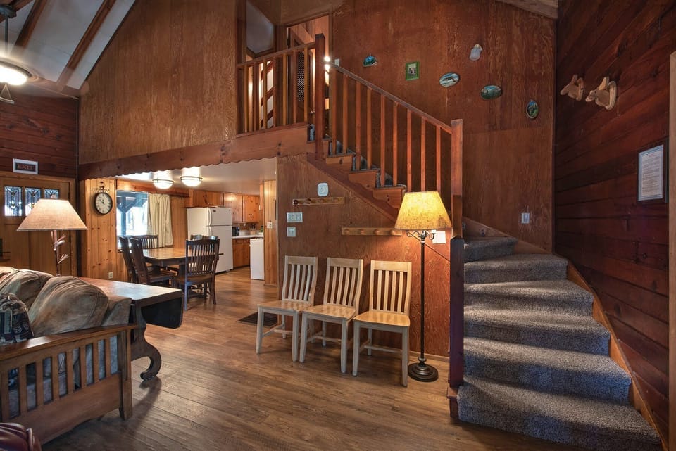 Living room view of stairs to second floor.