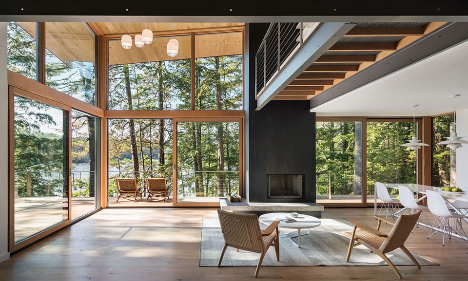 The house features expansive views over the lake and mountains to the north