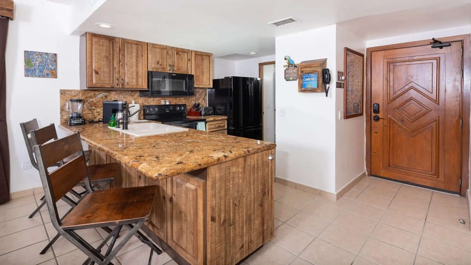 Full kitchen with generous counter space for easy entertaining.