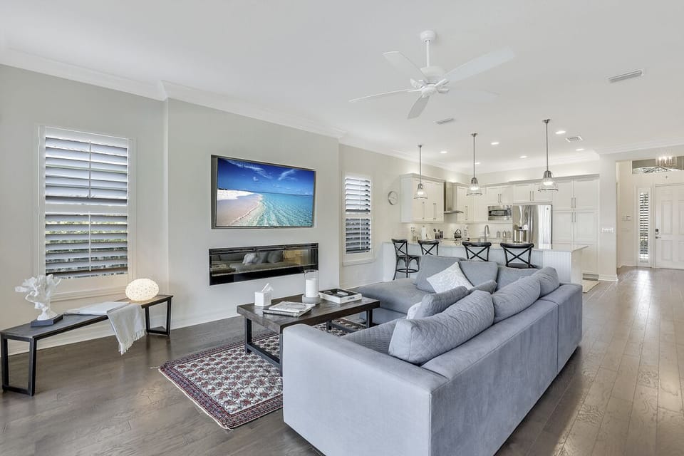 Living room with giant 75 inch HD Smart TV