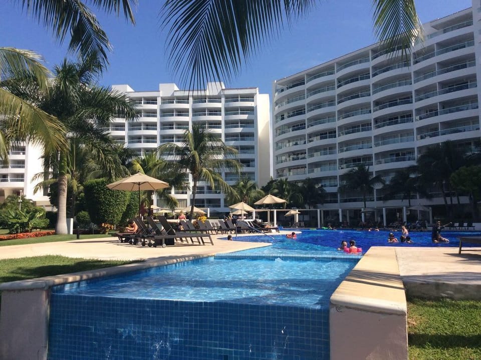 enjoy the 4 inter connected swimming pools