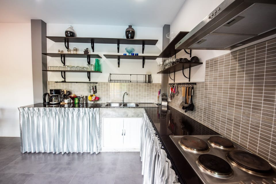 First house's kitchen with dining room 