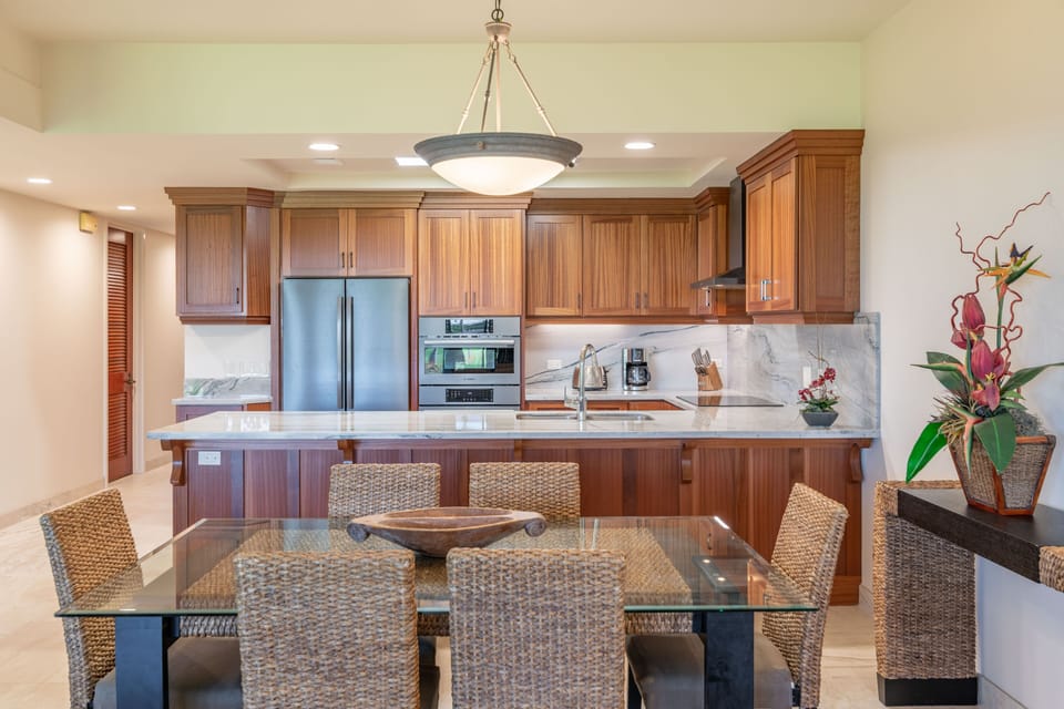 The great room provides ideal separation of the two bedrooms, comfortable dining indoors or out.