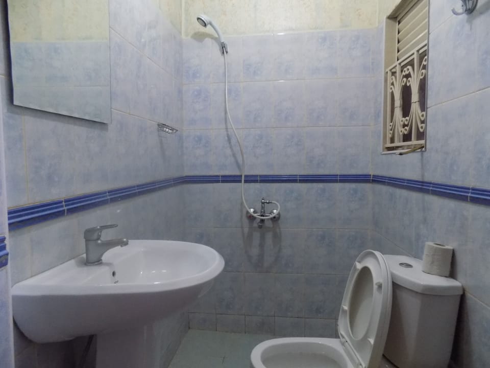 Shower, free toiletries, slippers, towels