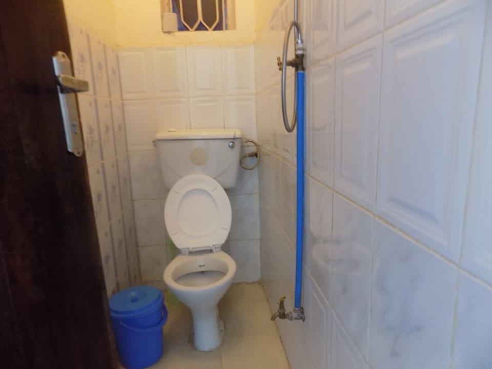 Shower, free toiletries, slippers, towels