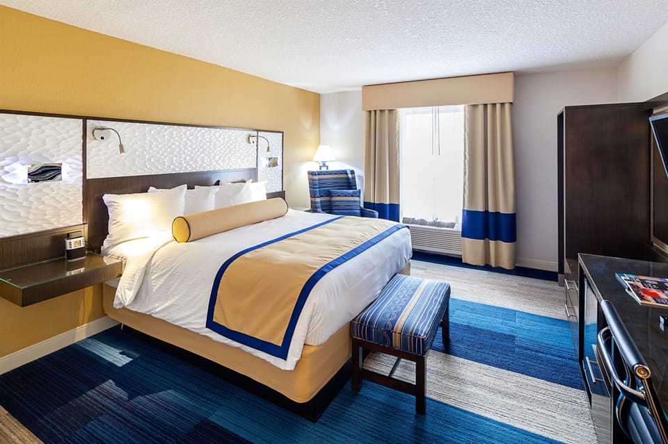 Premium bedding, down comforters, pillowtop beds, in-room safe