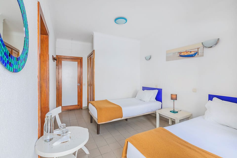 Twin Room, Private Bathroom | Free WiFi, bed sheets