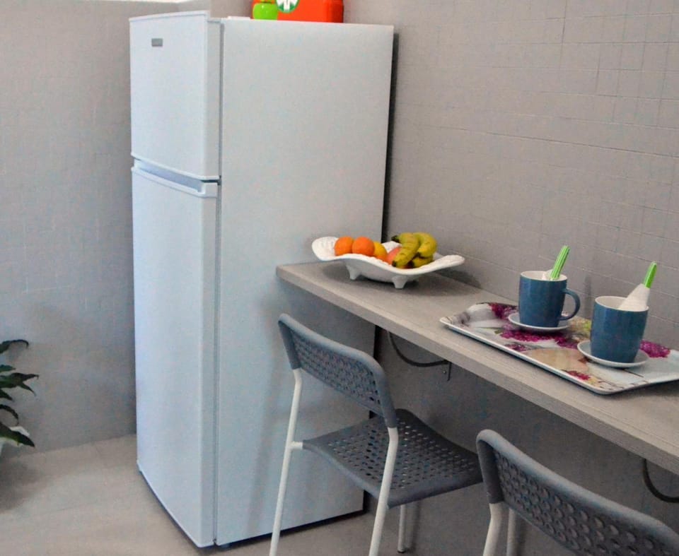 Shared fridge, electric kettle, cookware/dishes/utensils