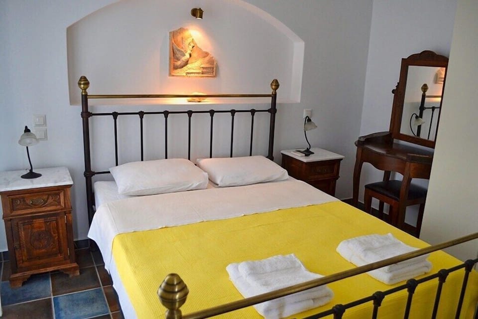 Apartment, 1 Bedroom, Sea View | In-room safe, desk, soundproofing, iron/ironing board