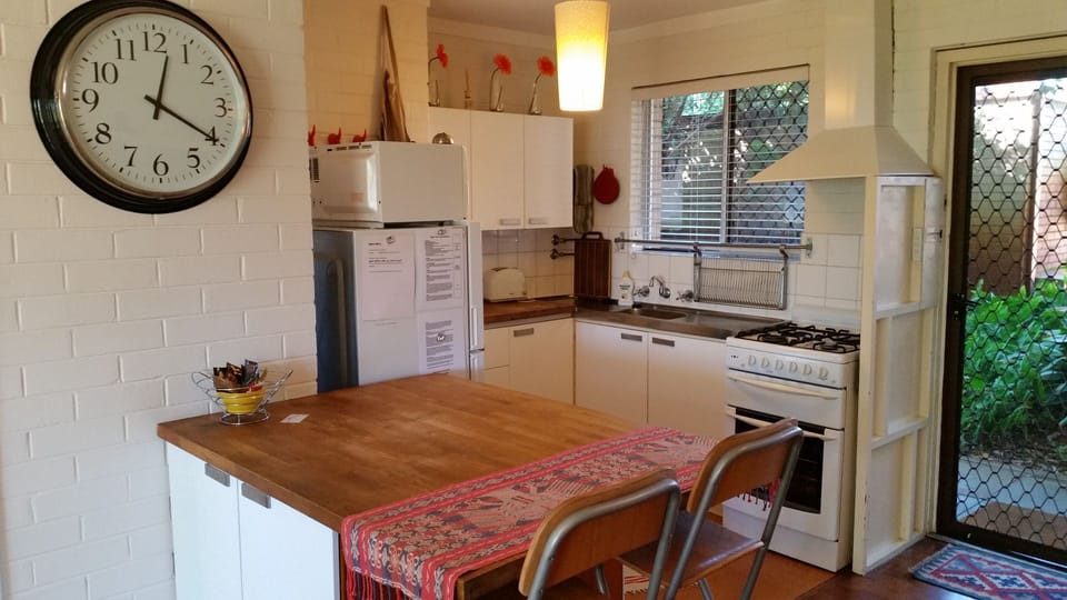 Kitchen with breakfast bar at Four on Whatley
