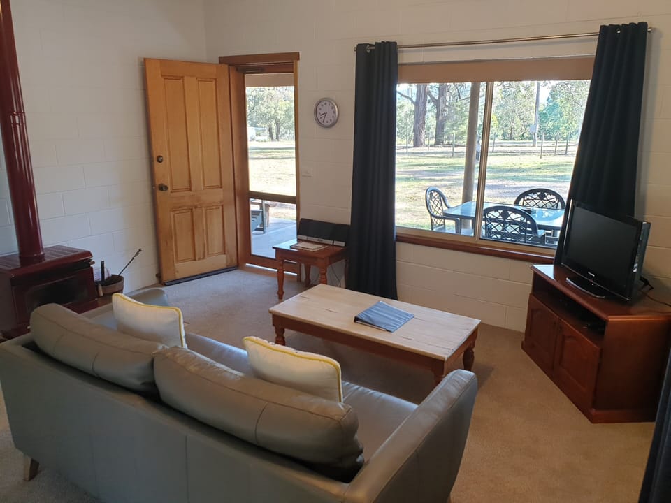 Lounge with TV, music system, DVD and woodfire in winter