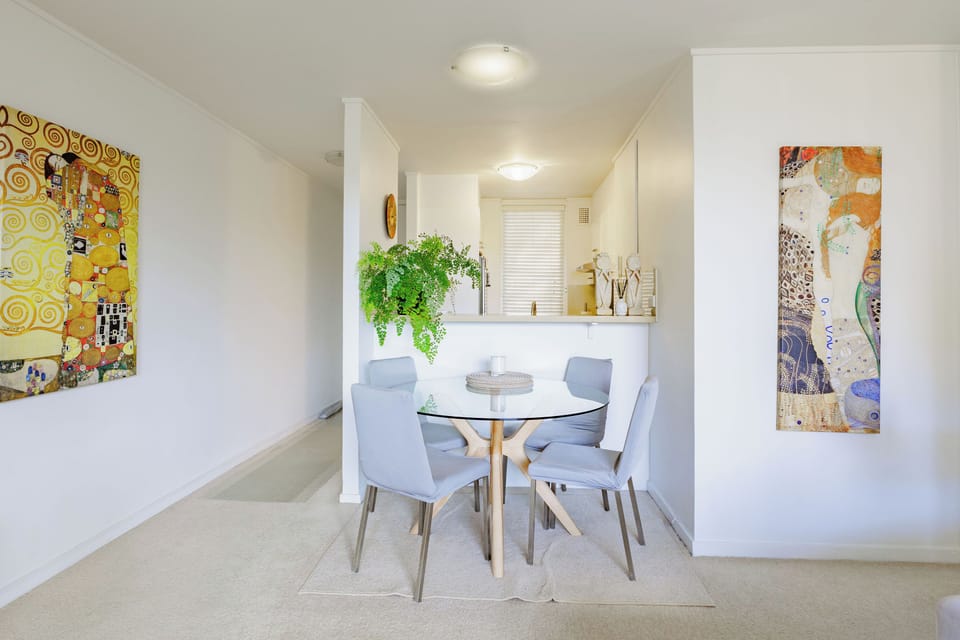 Dinning area. Table can be repositioned for seating of 6 persons. 2 extra chairs