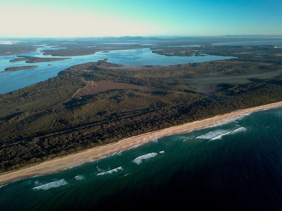 Aerial view of Booti Booti National Park over Seven Mile Beach
