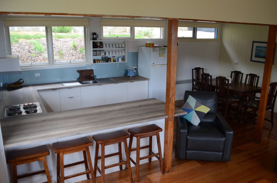 Looking into the kitchen & meals area from open plan lounge room