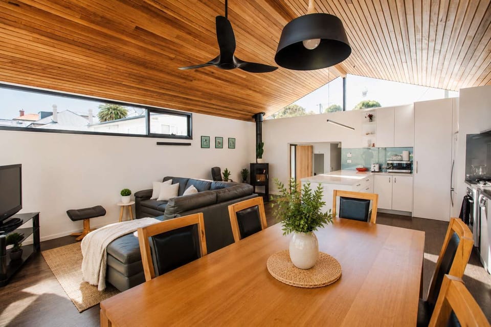 Large dining table with comfy chairs