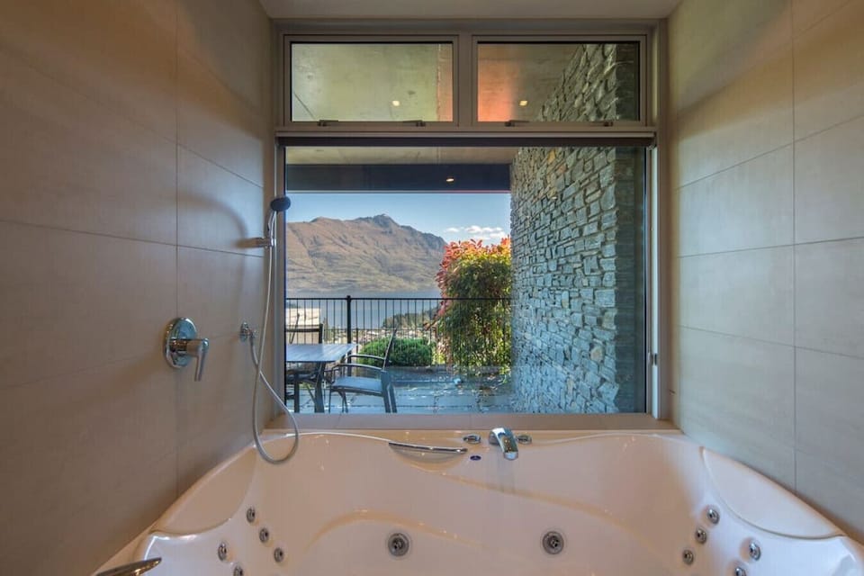 Bedroom 2 ensuite with separate shower and jetted bath