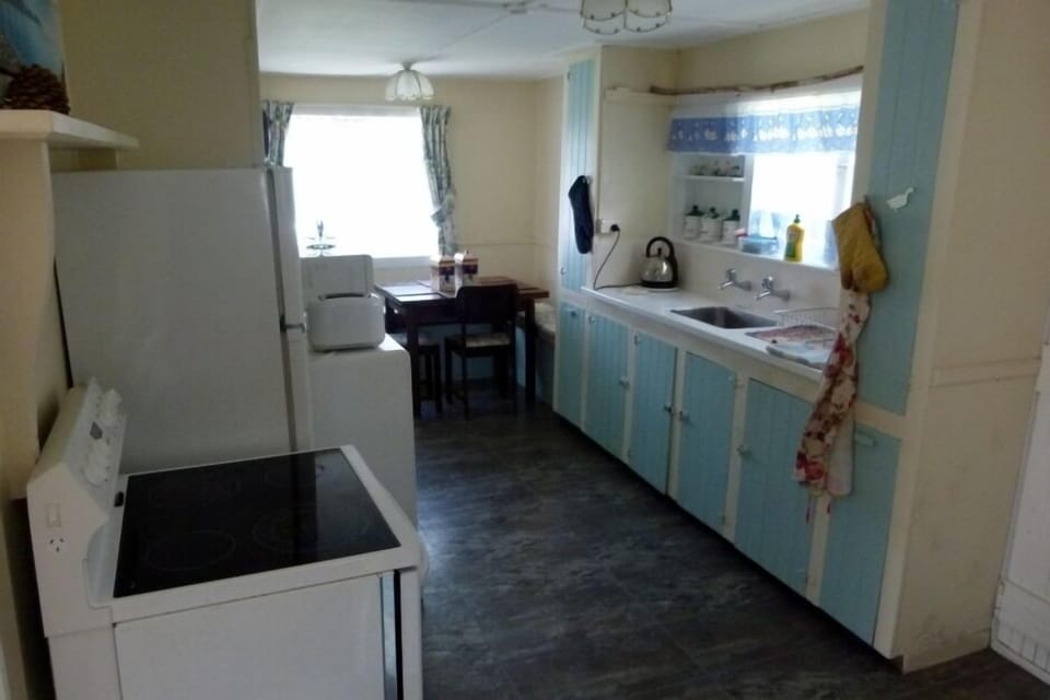 Self-catering kitchen with glass top cooker