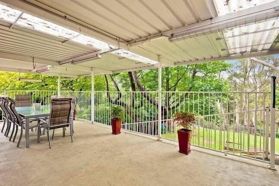Large covered back verandah with safety gate