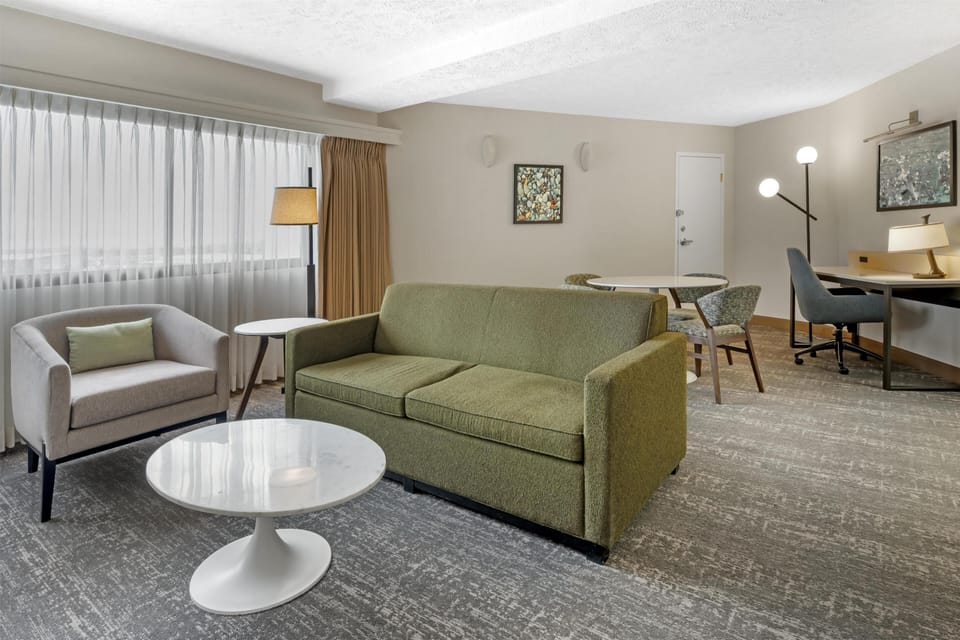 Suite, 1 King Bed (Ambassador) | Living area | 47-inch flat-screen TV with cable channels, TV