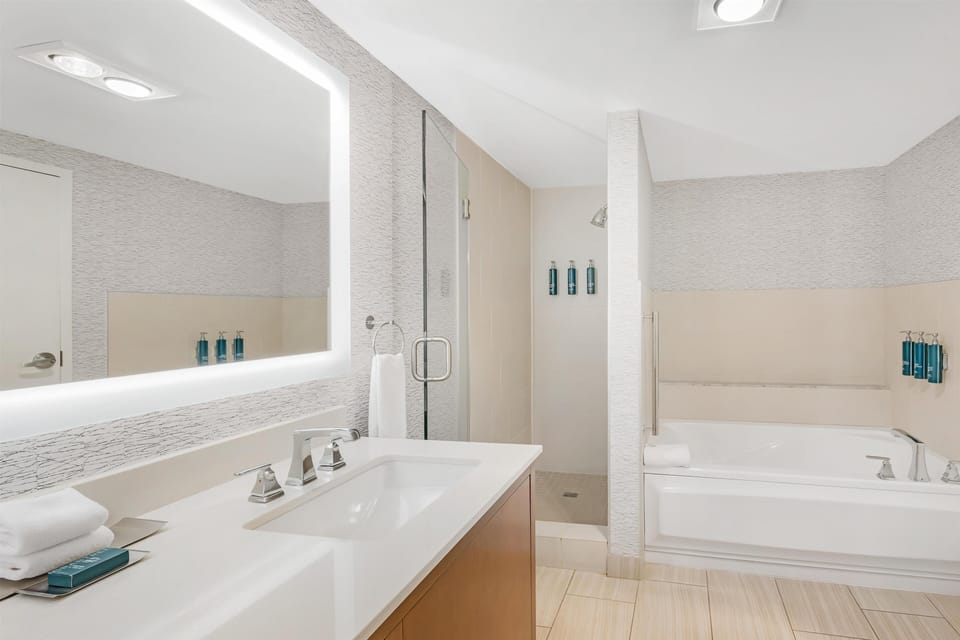 Suite, 1 King Bed (Ambassador) | Bathroom | Free toiletries, hair dryer, towels