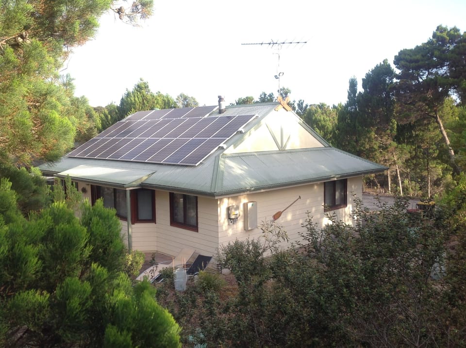 House nestled in natural bushland.