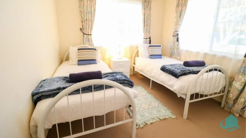 Single beds in second bedroom