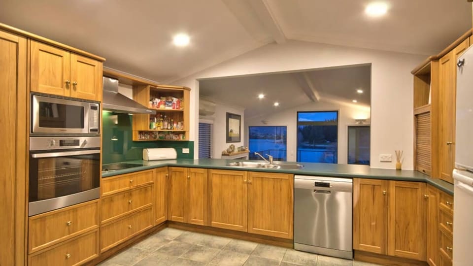Fully equipped kitchen over-looks the living area