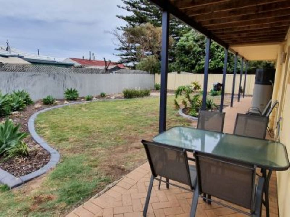 6 Seater Table and Chairs. Full size fenced and private rear yard.