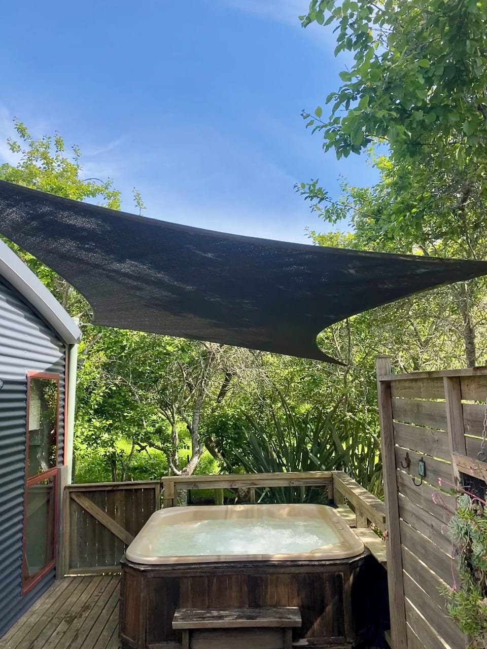 4 person hot tub on private covered deck
