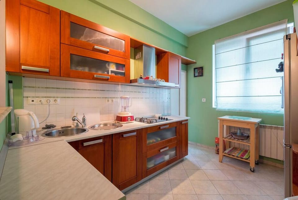 Kitchen. Entrance to Laundry room in the back on the left.