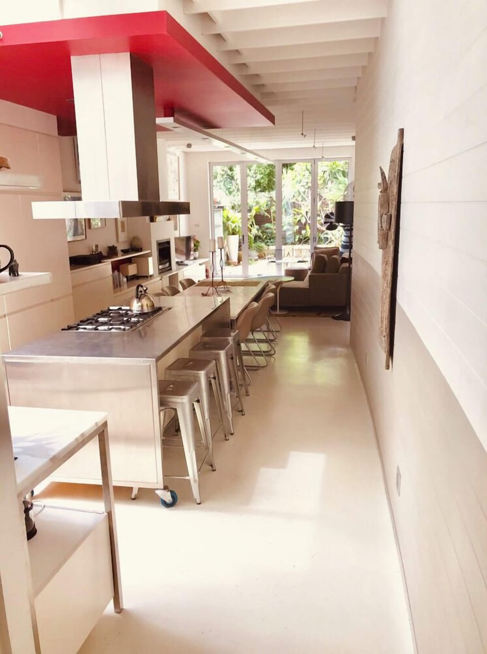 open plan kitchen/ dining room and living room connected to north facing garden