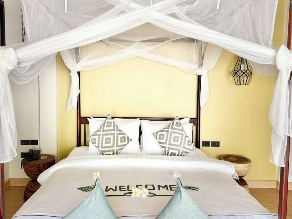 Seaview Family Pool Villa | Select Comfort beds, minibar, in-room safe, desk