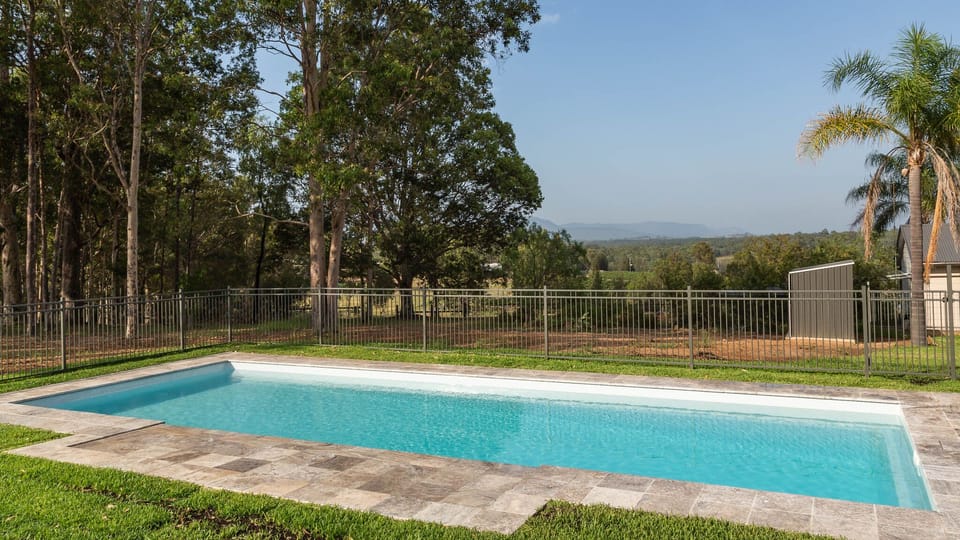 A pool with a view.

Hermitage Hideaway Hunter Valley