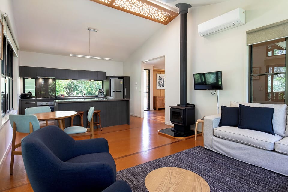 Weyba Lakehouse dining and kitchen and wood fire