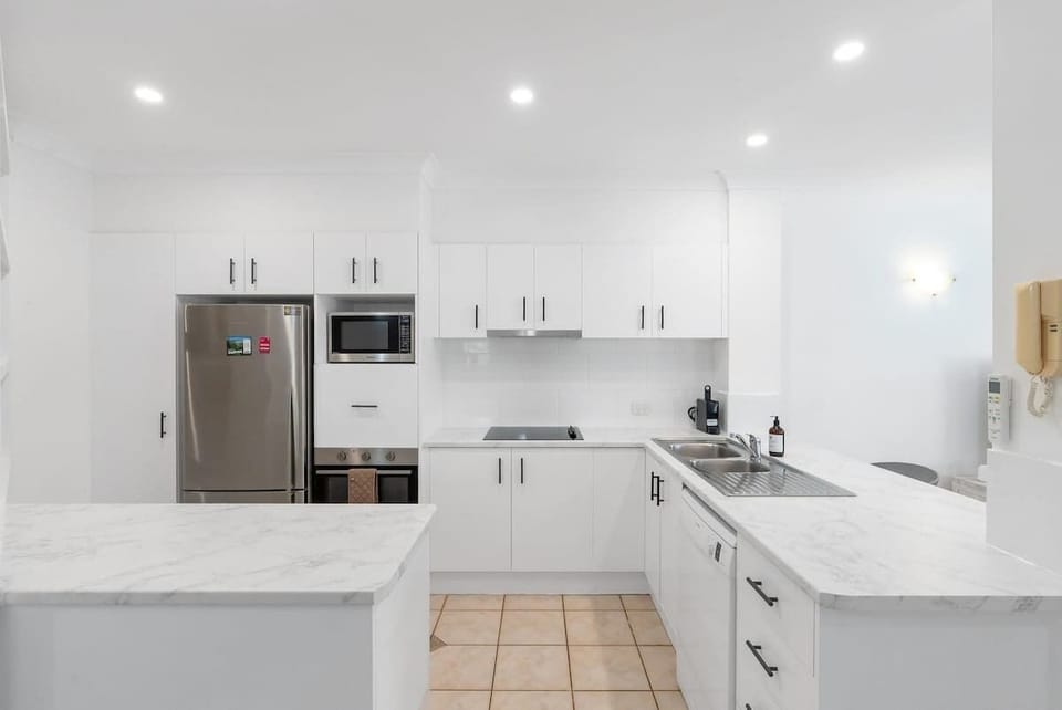 Explore your culinary skills in the full kitchen, equipped for your cooking needs.