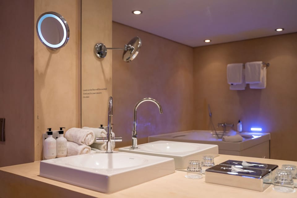 Waterfront Junior Suite | In-room safe, desk, soundproofing, iron/ironing board